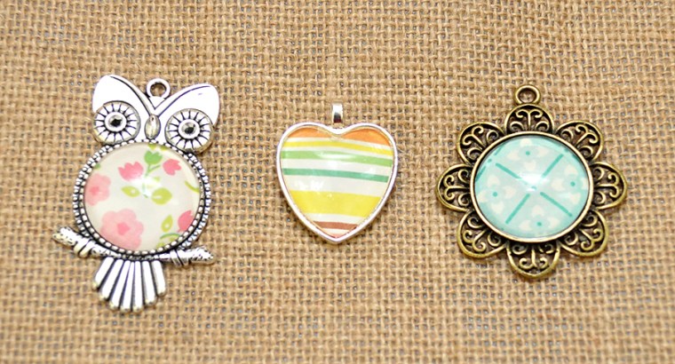 Scrapbook paper pendants. Inexpensive and fun YW Girls Camp craft! or YW gift!